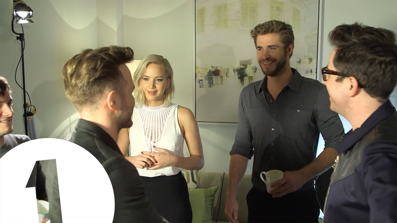 Jennifer Lawrence meets Olly Murs. He awkwardly 