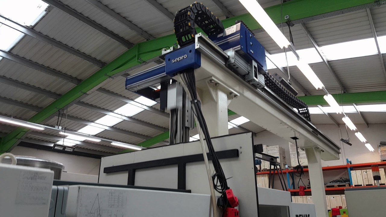 Demag 100T with Sepro robot refurbished by STV Machinery
