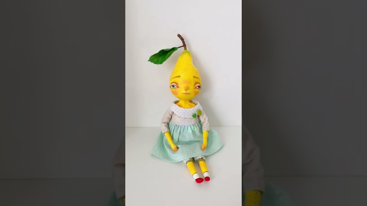 The collectible handmade art doll Bitten Pear