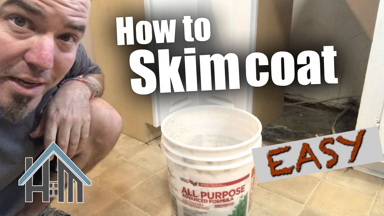How to skim coat, apply drywall mud and fix walls. Easy!
