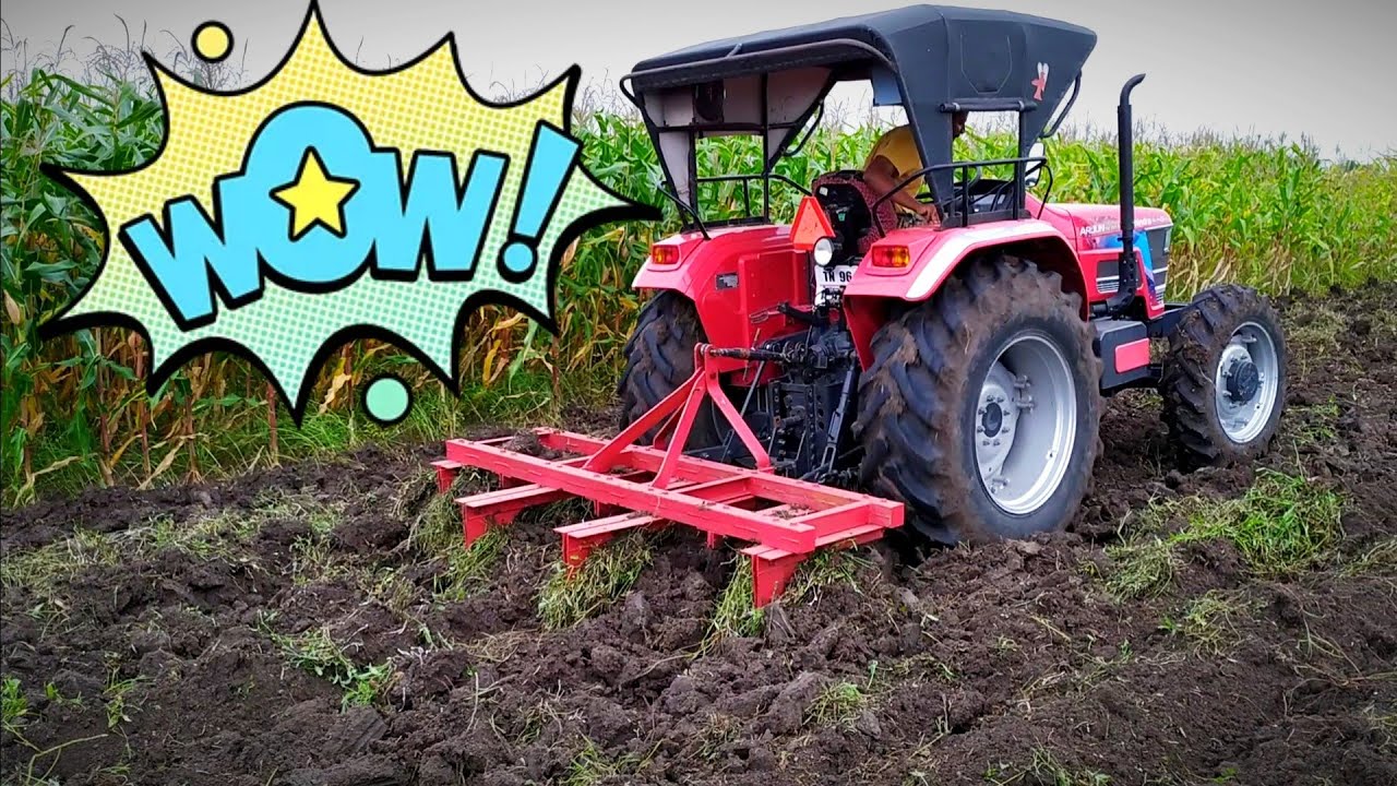 tractor Mahindra novo 605 di i 4wd tractor with 7 Tyne duck foot cultivator performance