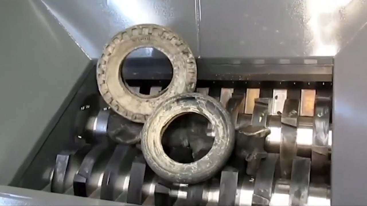 Modern crushers destroy giant car tires | mass destruction machine.