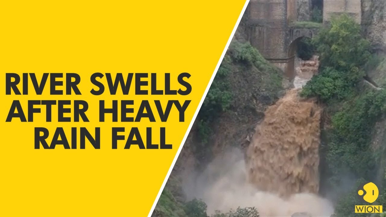Spain's Malaga river swells after heavy rains