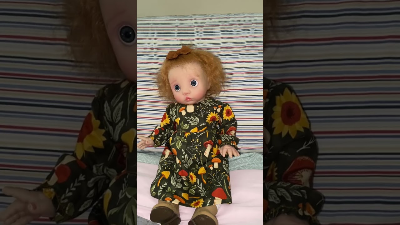 #peekawednesday  @Tatortotsrebornnursery  Libby loves her new dress and her puppy Butterscotch! 