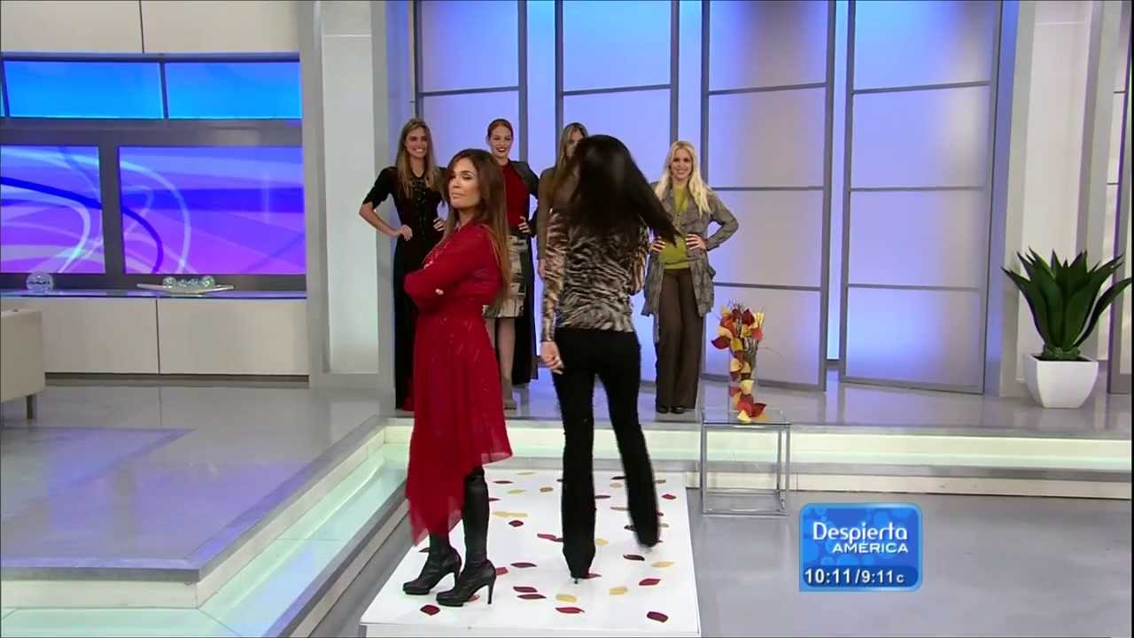 karla martinez gets help putting her thigh high boots