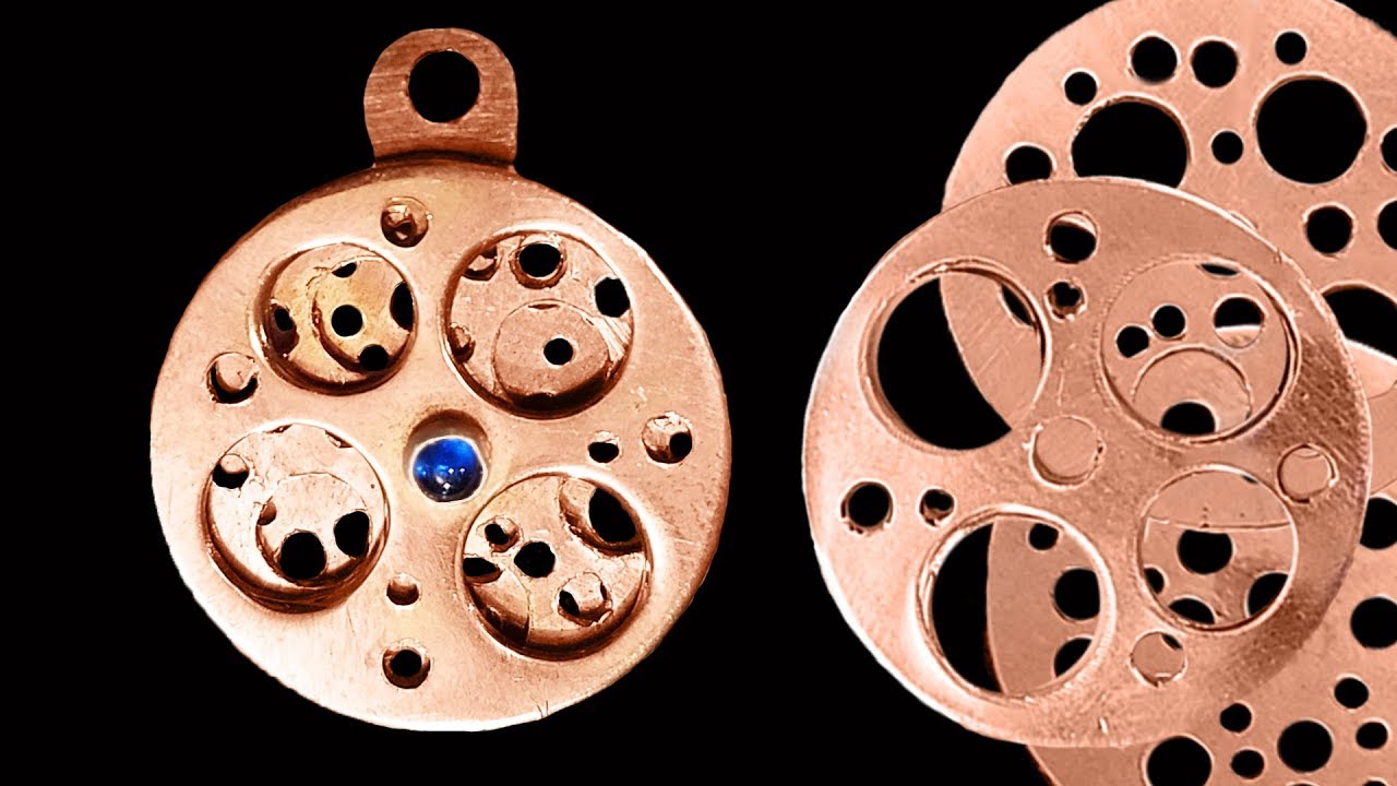 Learn The Secret Hidden In This Kinetic Pendant