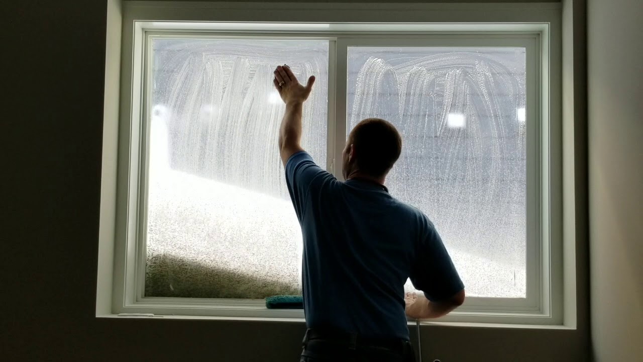 Construction Cleaning Tempered Windows