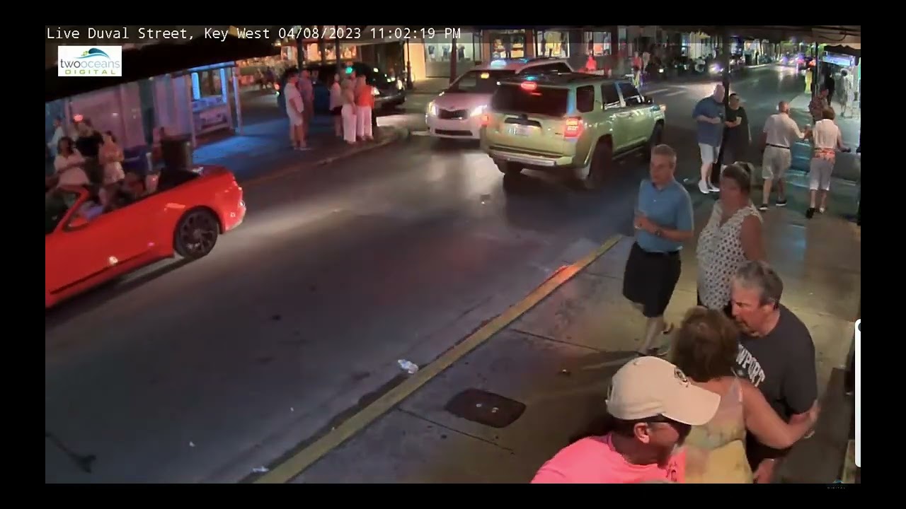 bystanders help man who collapses. Another interesting key west street scene