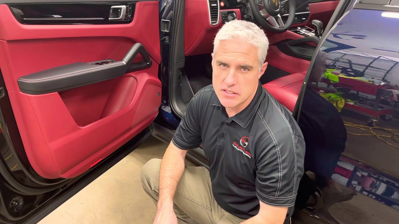 How to remove the driver's door interior trim panel on a 2020 Porsche Cayenne Coupe.