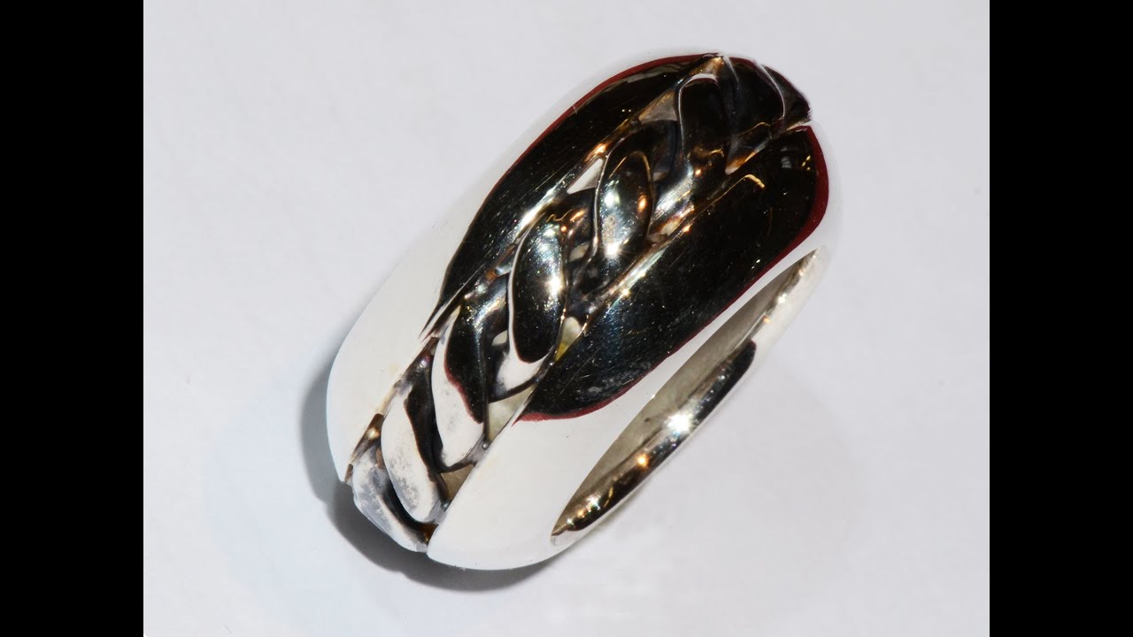 Silver ring handmade with central spiral pattern