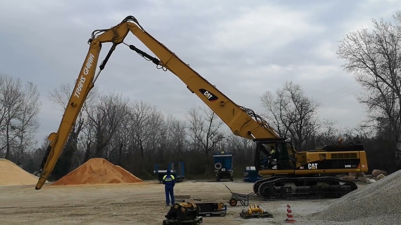 ESCAVATORE GIGANTESCO CATERPILLAR 345 DEMOLICTION DA 700 QUINTALI COME SOSTITUIRE IL BRACCIO Di 30m