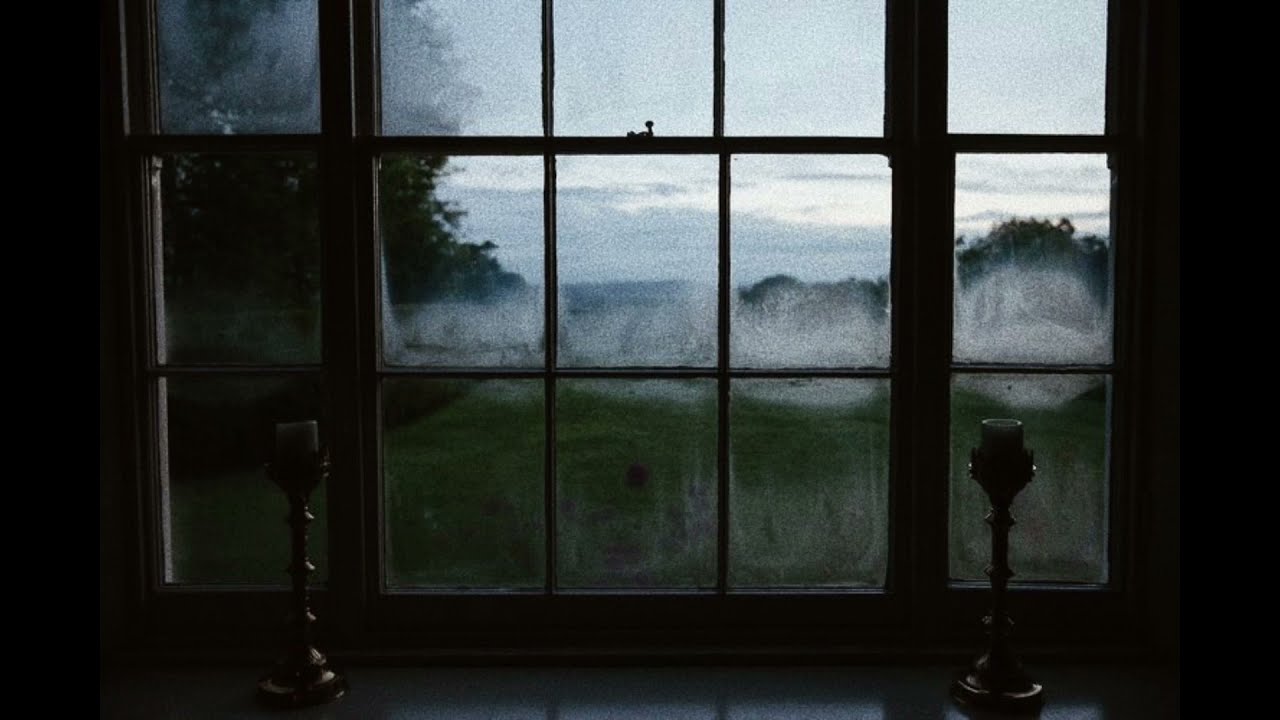a villette playlist | lucy snowe sits by the window on a rainy & gloomy day