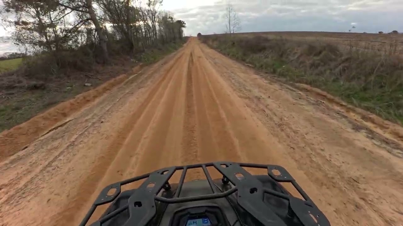 Me enjoying riding my new atv 