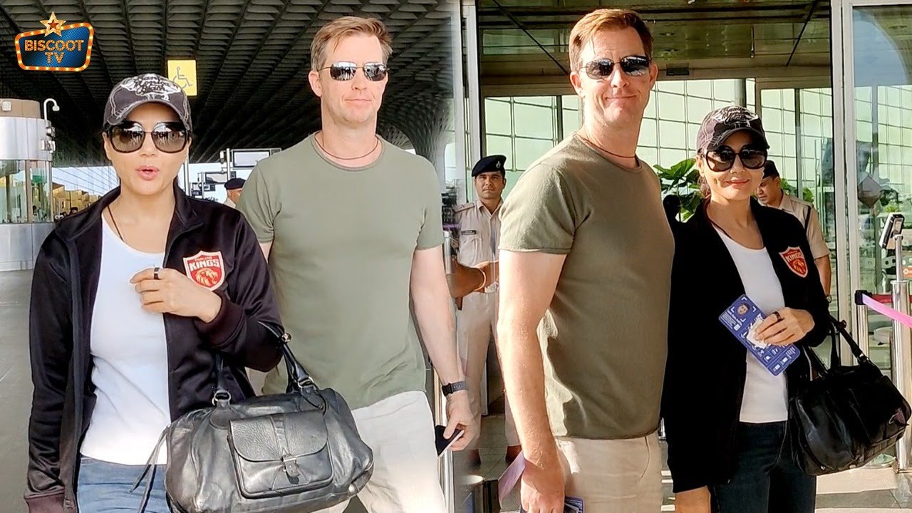 Queen of Punjab Kings With Her Husband at Airport