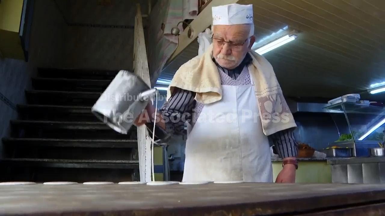 Almost 80, a West Bank vendor is renowned for Ramadan's favorite dessert
