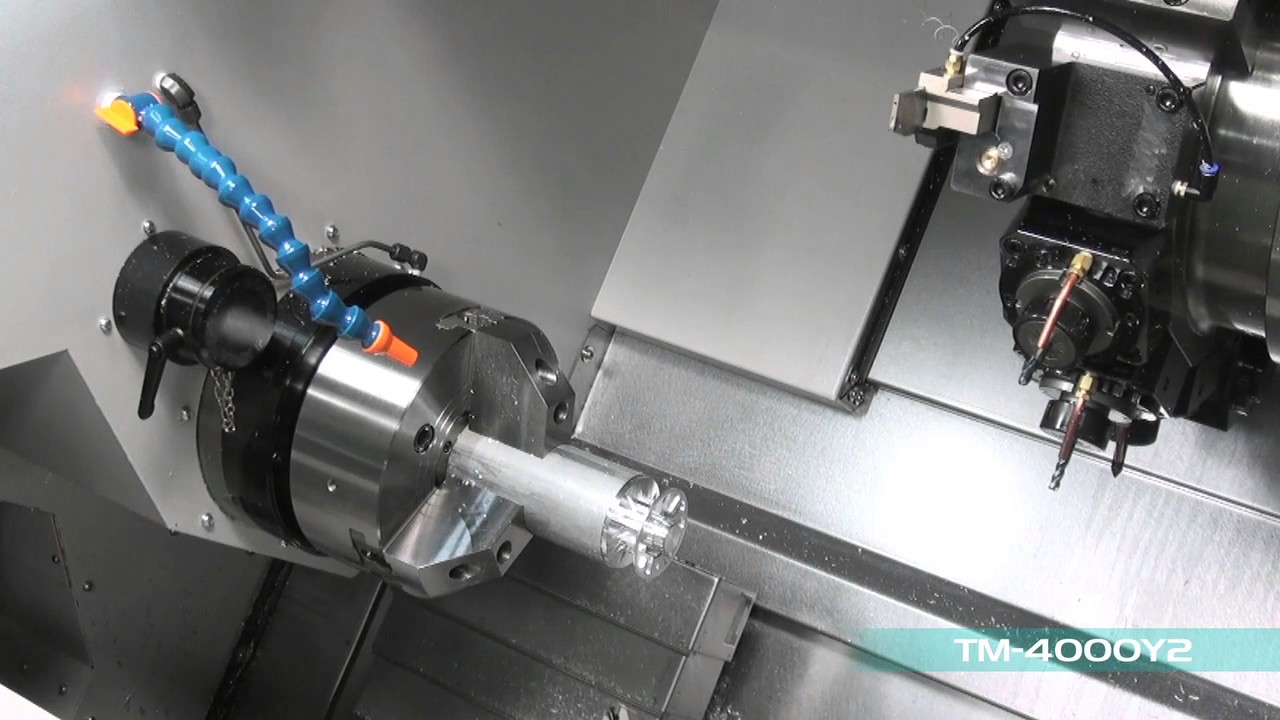 Centre de tournage bi-broches bi-tourelles 2 Axes Y TAKISAWA TM 4000Y2