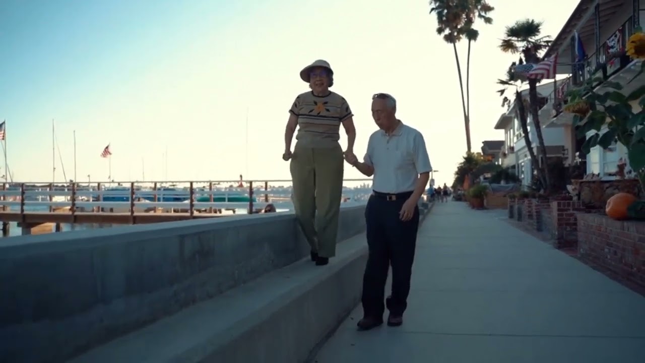 Elderly Couple Walking on the Bayside