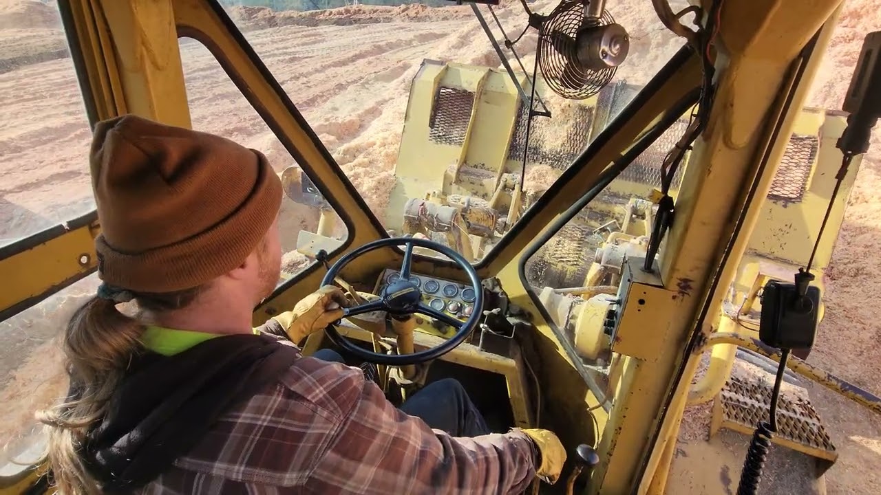 Maintaining chip pile with a 1965 Cat 988 Loader with oversized chip bucket