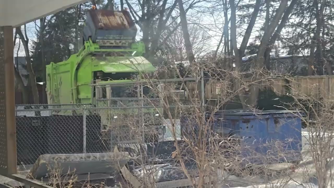 GFL Front Loader Empties Recycling Container