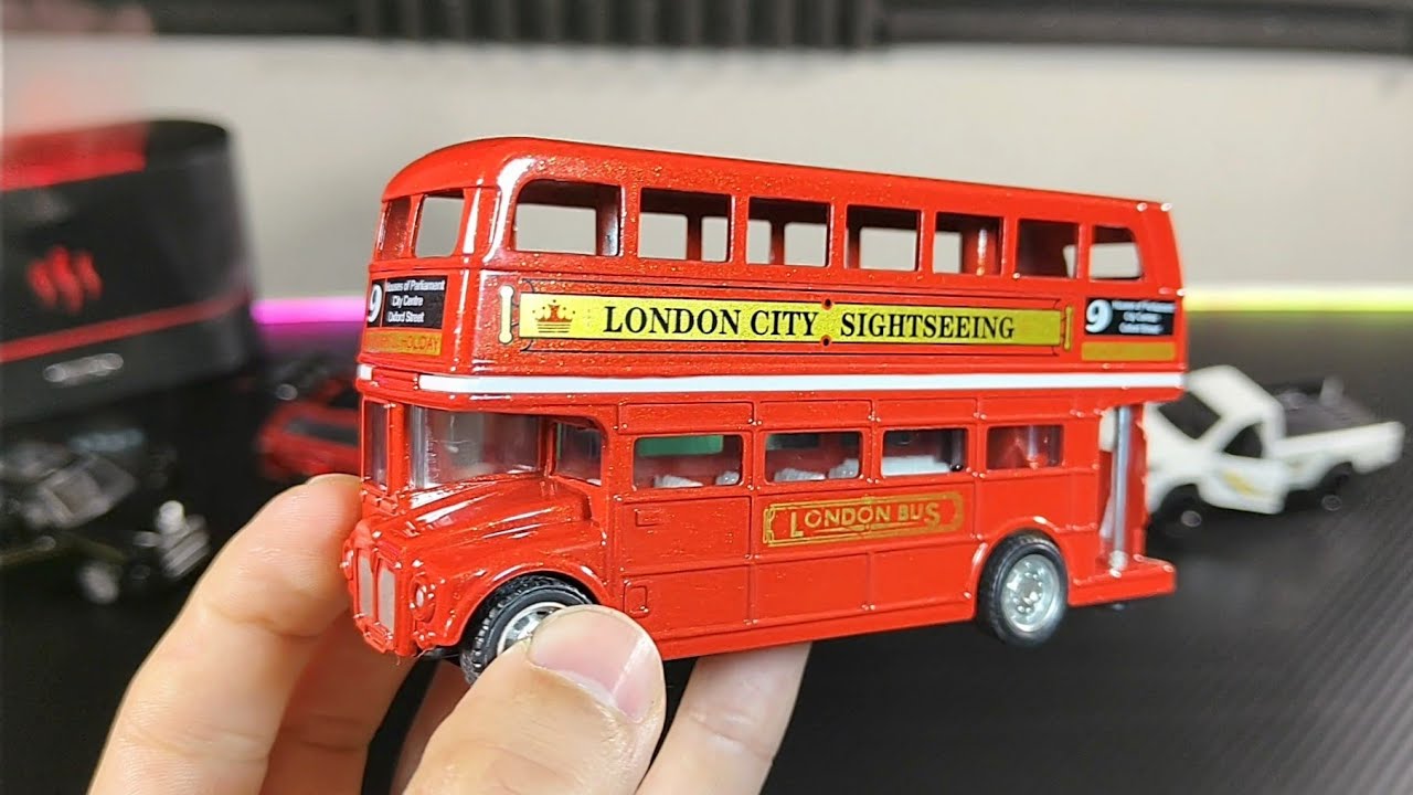I'm testing toys: London City Buss, Pickup truck, luxury class car, family car.
