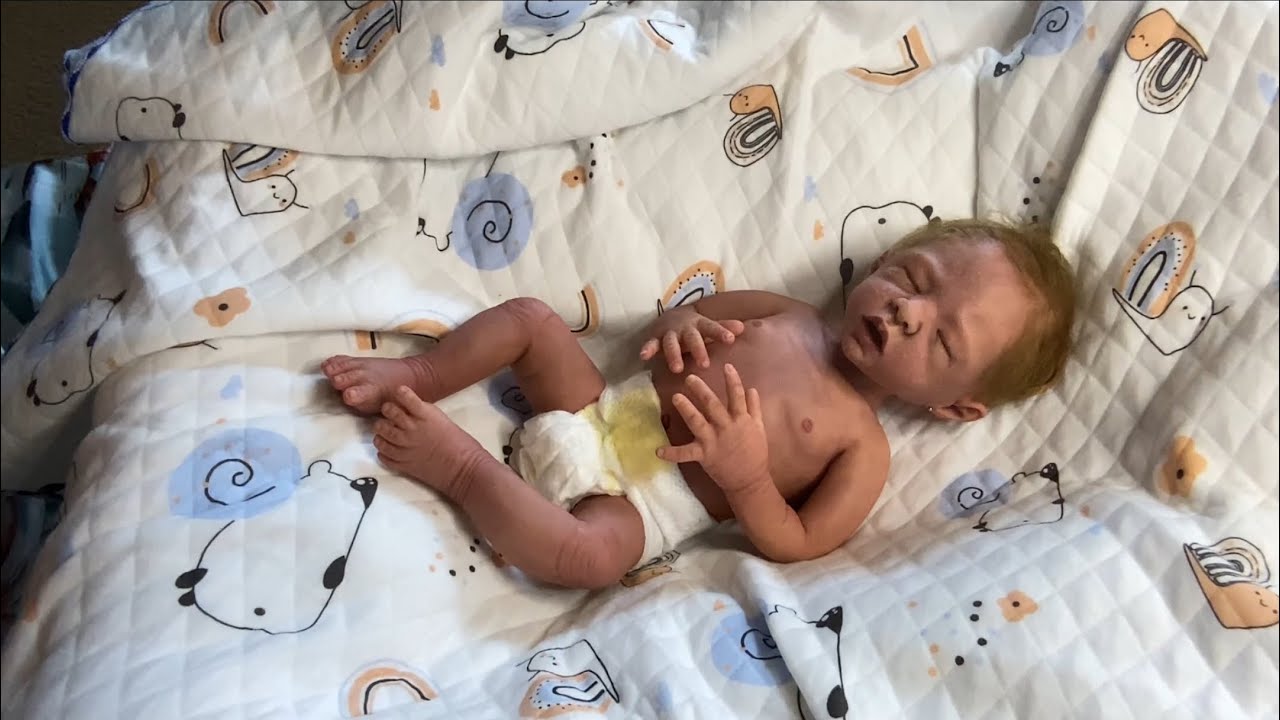 Full body silicone micro preemie baby hope is getting in  outfit change 🥰