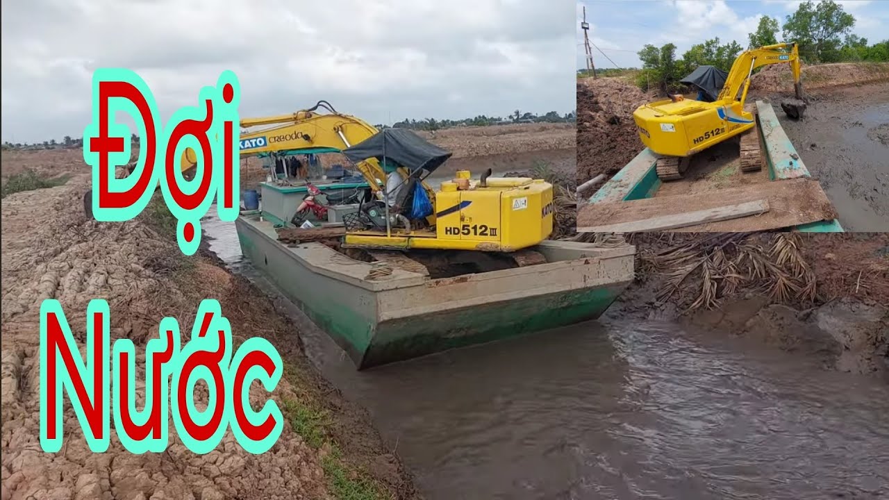 Экскаватор Kato из Западного Вьетнама ожидает притока воды.