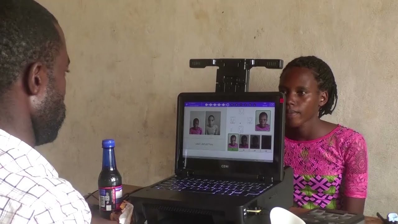 Here’s why some voters in Congo need a police guard to sign up