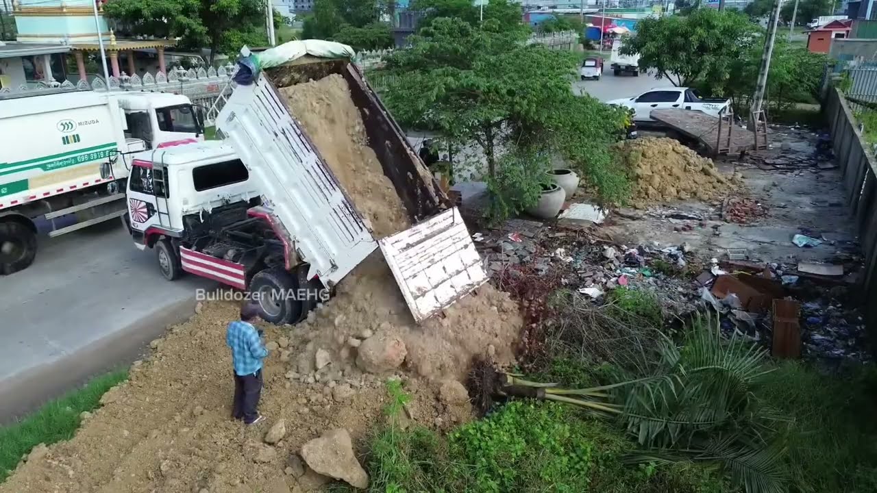Full Process Of Land Filling On Flooded Land By 5Ton Dump Trucks And KOMATSU, HITACHI Bulldozers.