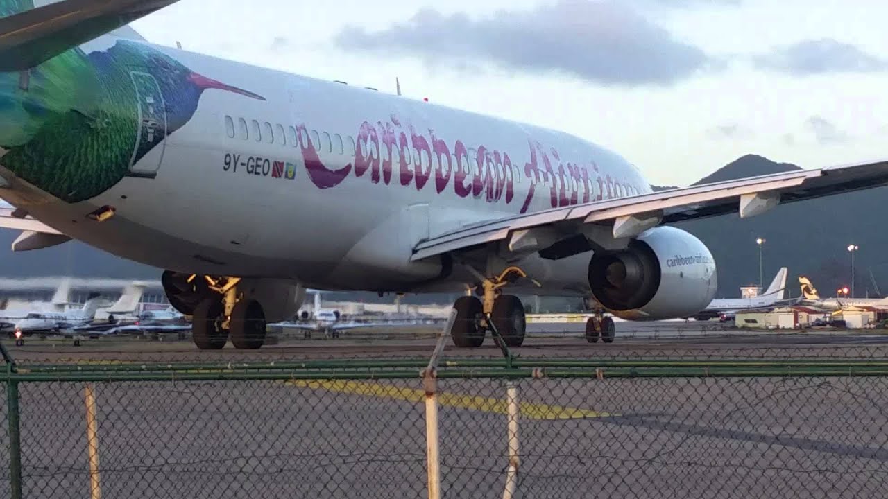 Beware of jet blast! Maho Airport Beach, Saint Maarten.