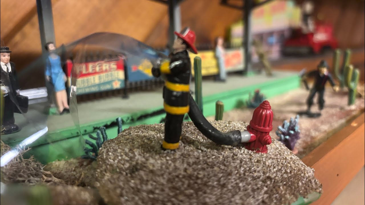 Adding burning flames & fireman with hose