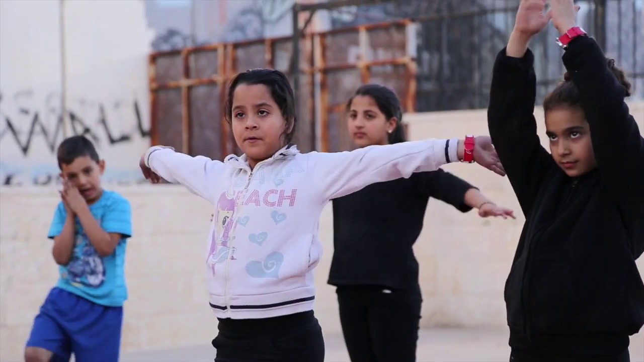 Yoga at the wall, Palestine