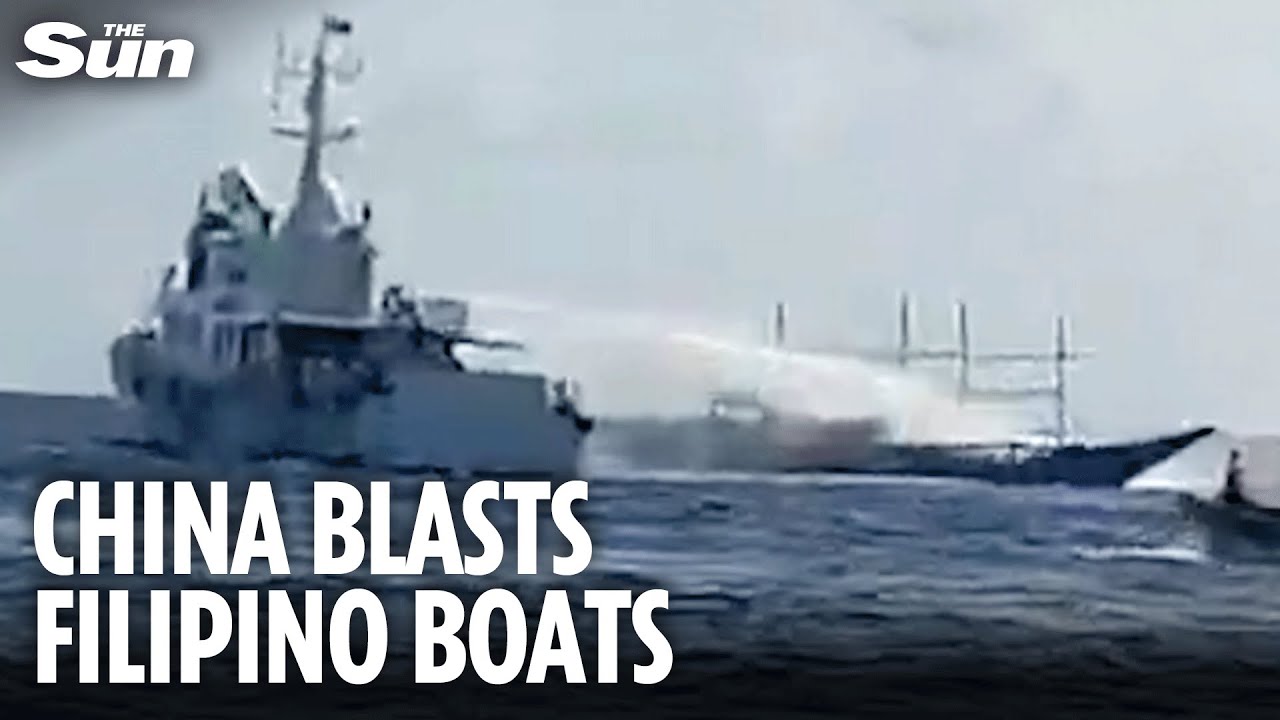 Disguised Chinese military militia fires WATER CANNONS at Filipino fishing boats in disputed waters