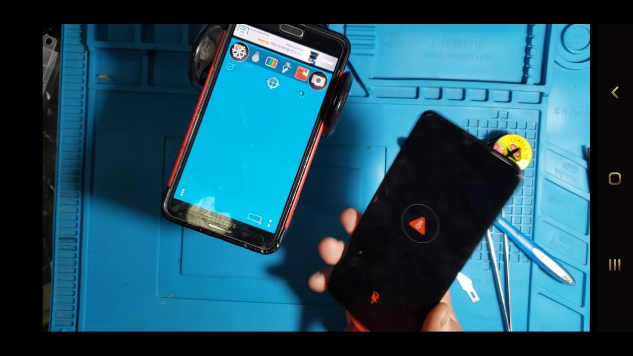 Samsung  A20 no carga le sale un triangulo rojo problemas de temperatura