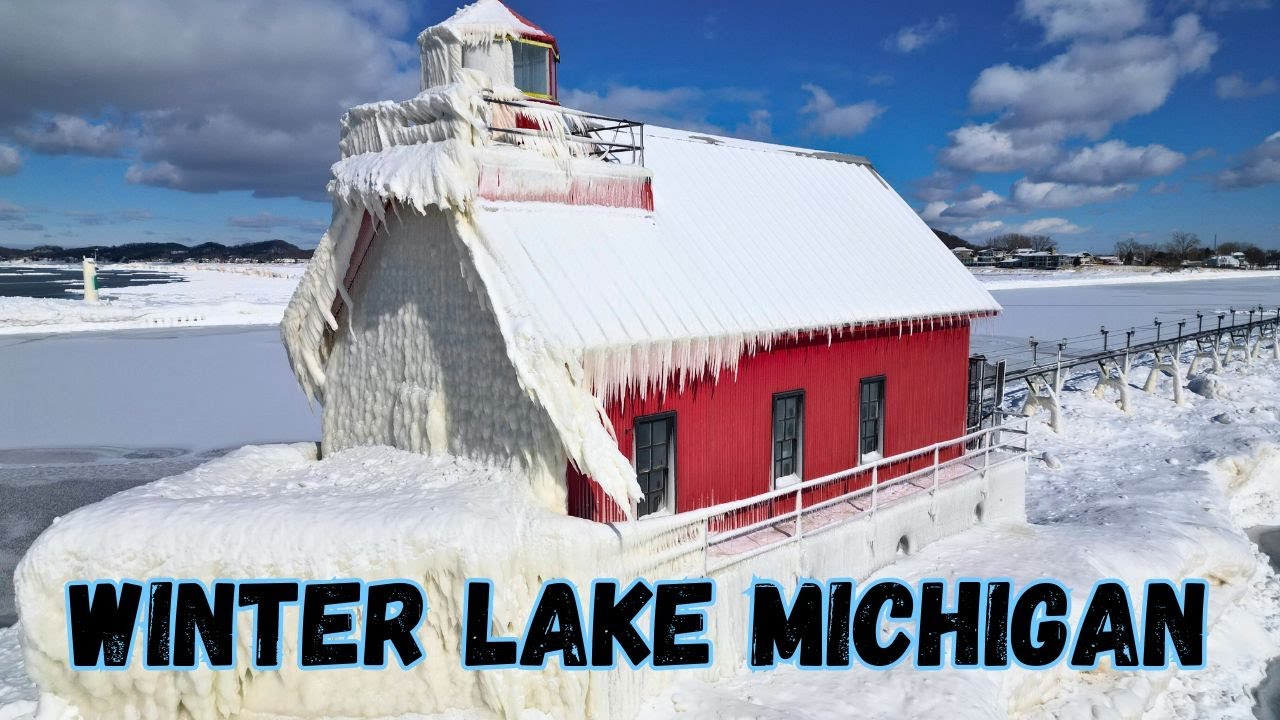Grand Haven Winter: Drone Flight Over Lake Michigan Ice And Lighthouse