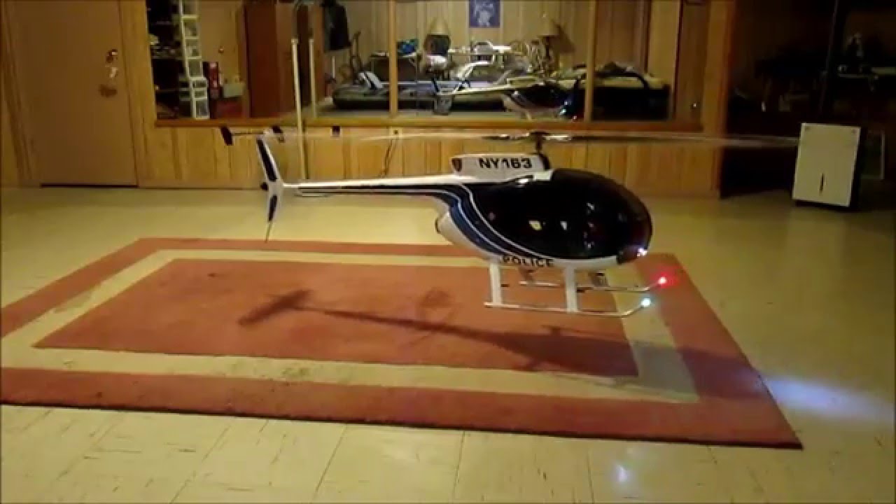 MAN CAVE HOVER, Hughes MD500... 800 size model helicopter.