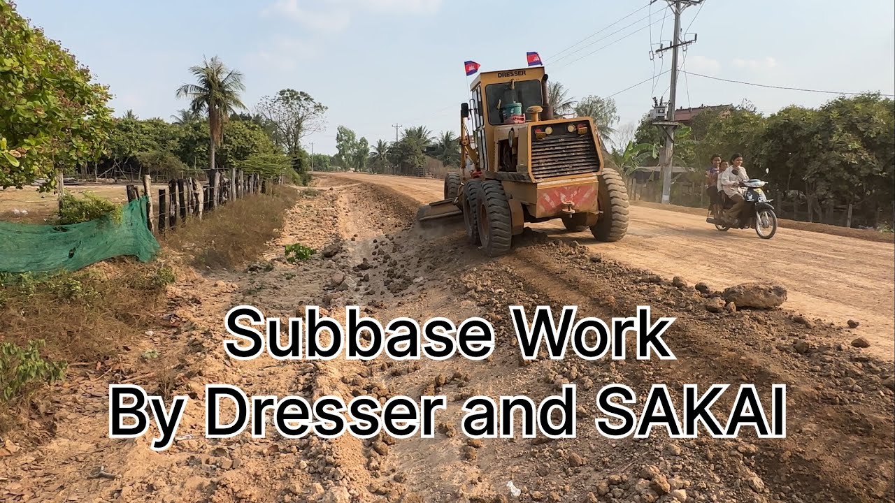 Motor Grader Dresser, Roller Sakai and Water Truck Hino Operating for DBST road on Subbase Layer
