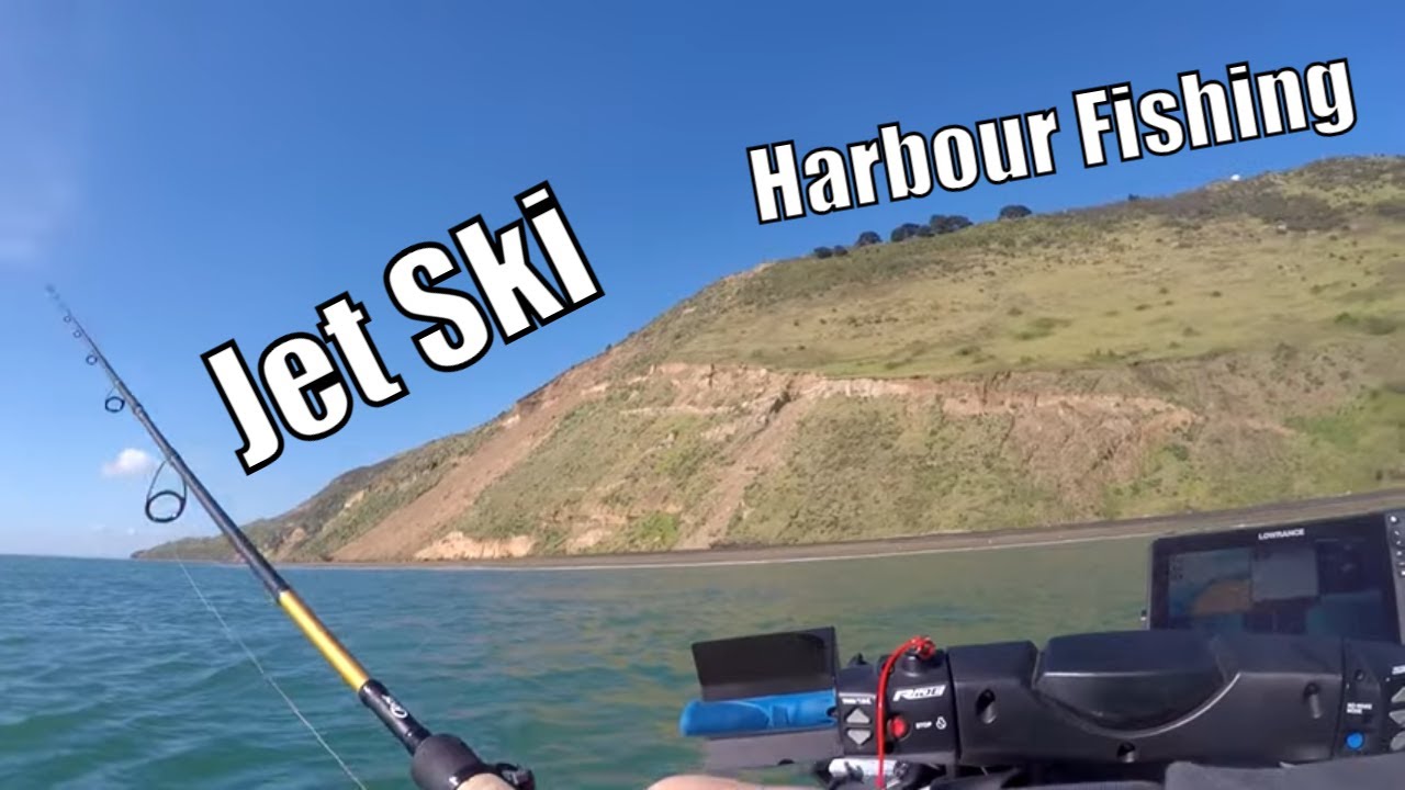 Catching fish from a jet ski in the harbour