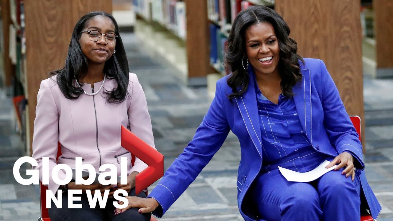 Michelle Obama meets students at her alma mater high school before the launch of 'Becoming'