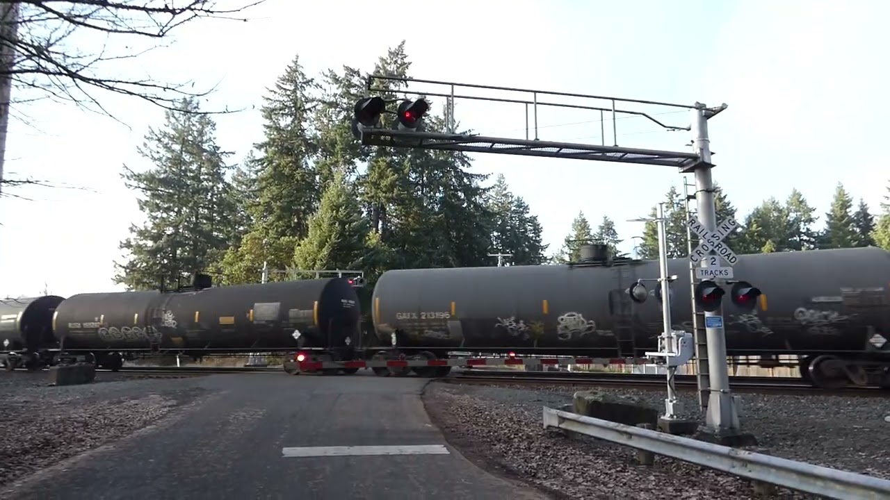 (Northbound) Union Pacific Manifest Train passes through the Atchinson Road Railroad Crossing.
