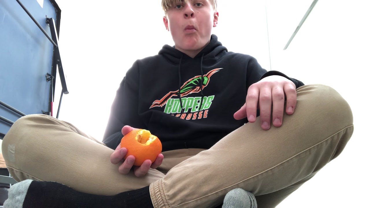 Eating an orange like an apple
