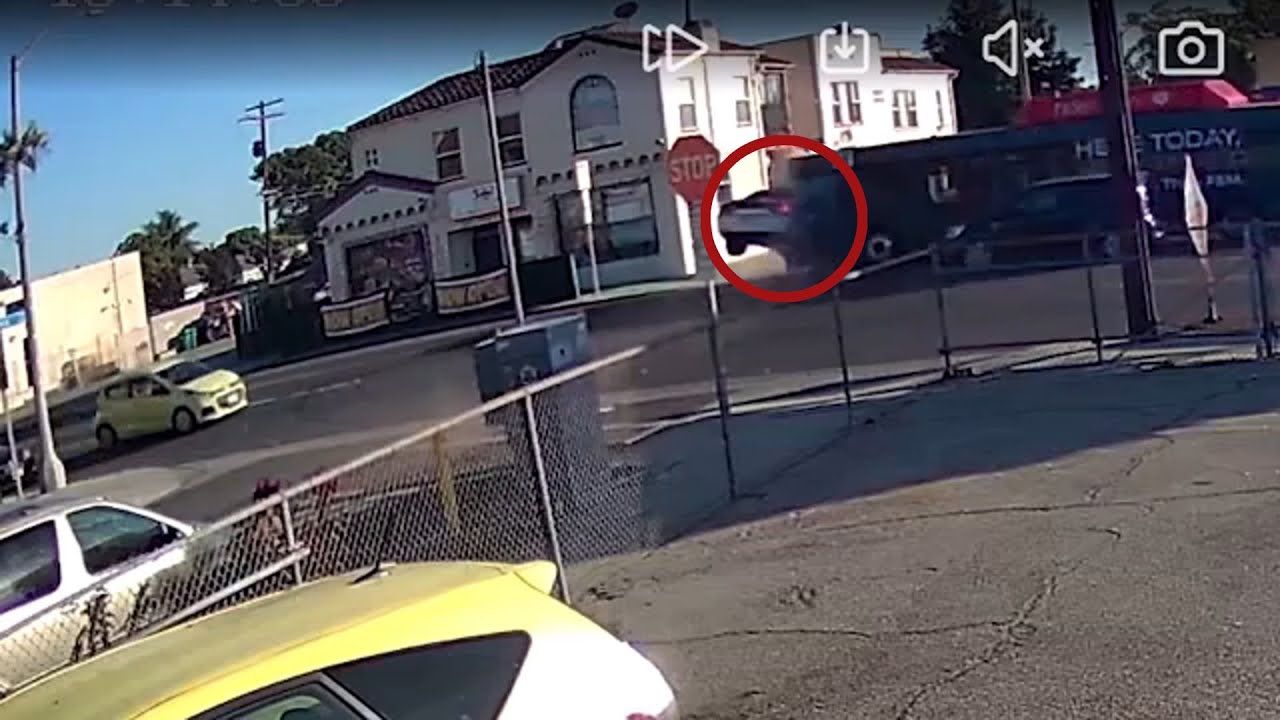 Bus slams into car, both crash into Long Beach restaurant; 14 injured
