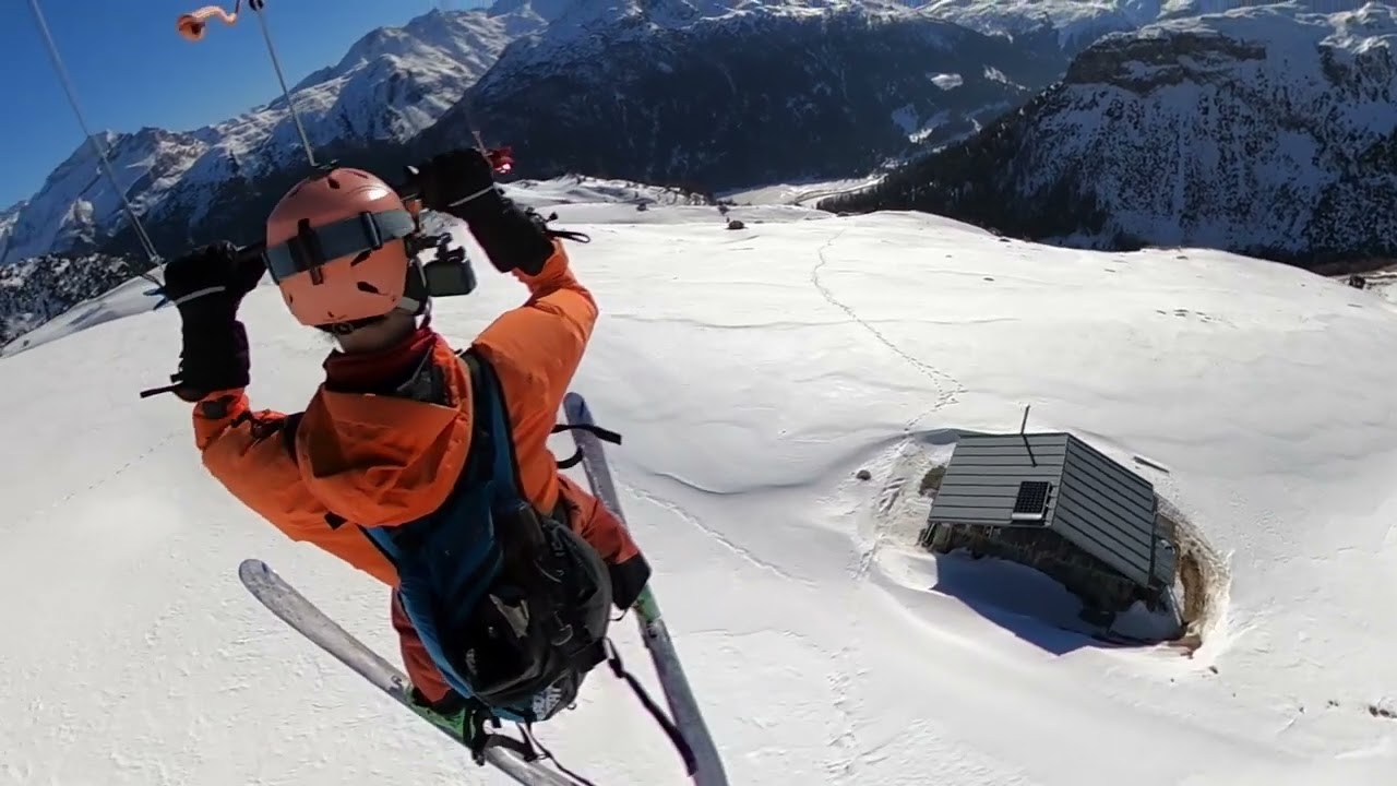 Long flight by kite at the Cufercalhut in Switzerland / a nice snowkite day