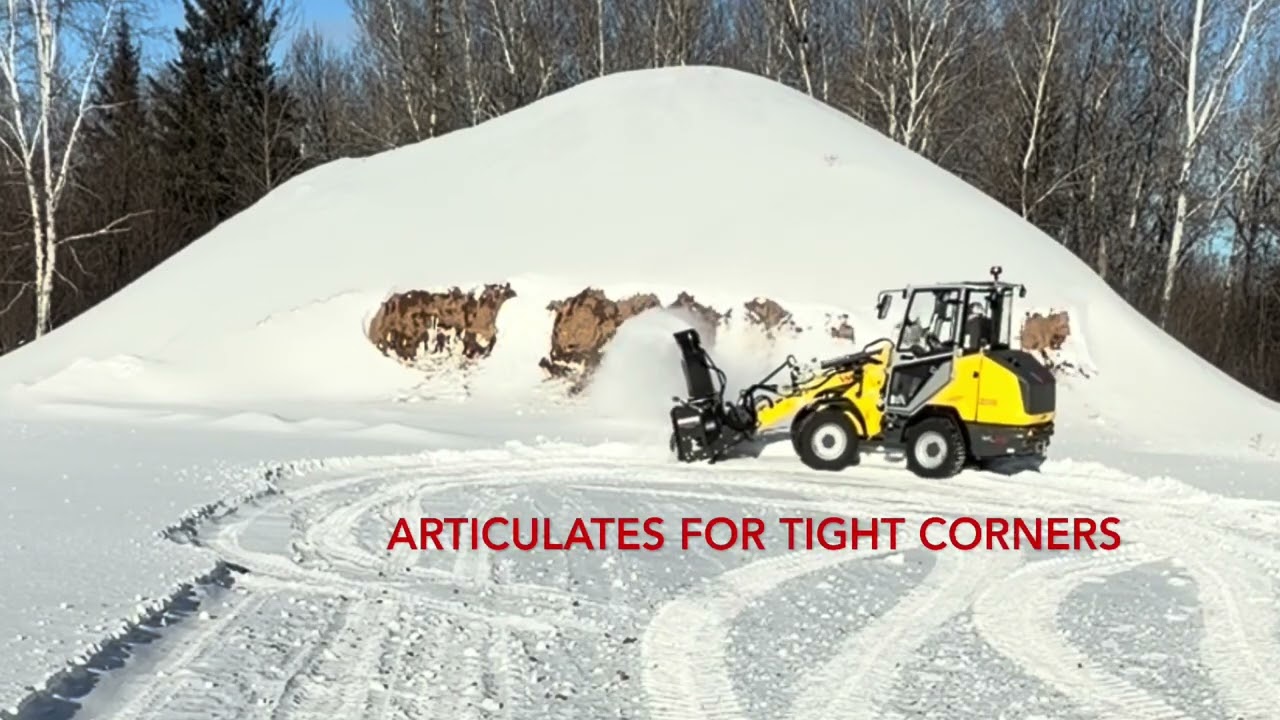Wacker Neuson wheel loader WL28 with a Erskine SB300 Snow Blower. 