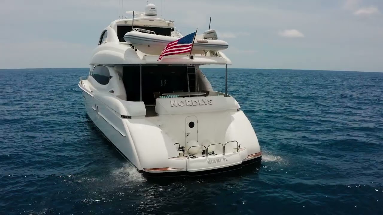 2003 80 Lazzara Sky Lounge.  Offered by: OneWater Yacht Group.  Dennis Smith