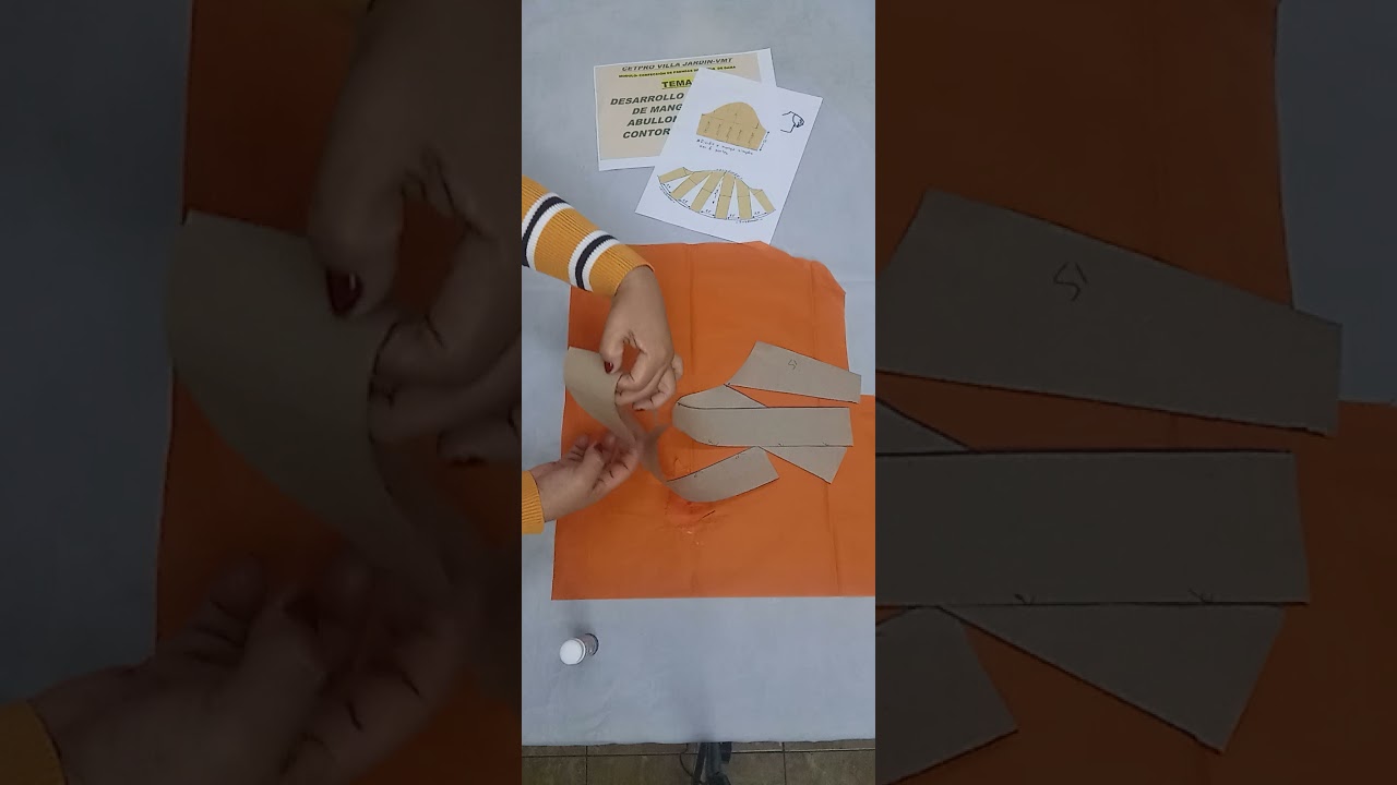 Manga corta abullonada en el brazo