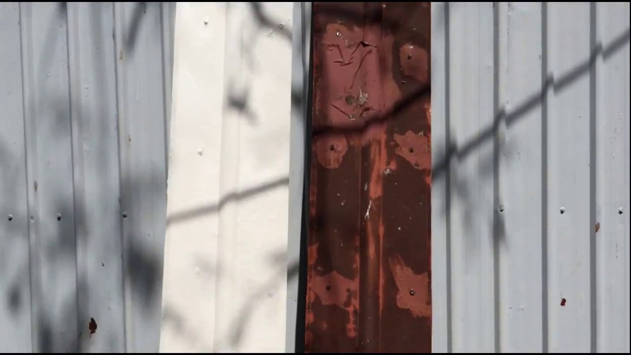 HOW TO PAINT RUSTED METAL ROOF?