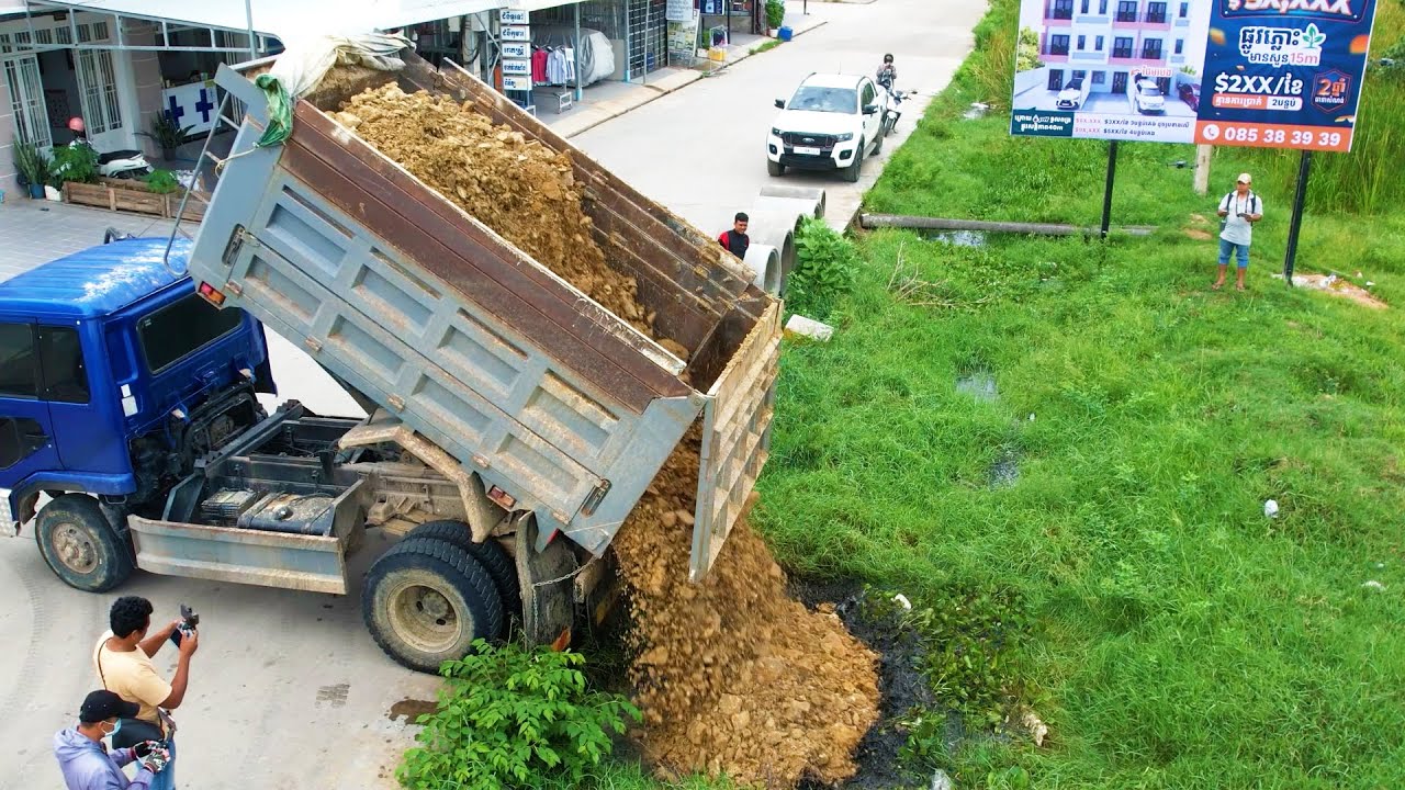 Perfectly Project Landfilling & Clearing Mud Across the Canal Skillful by Dump Truck Dumping Soil