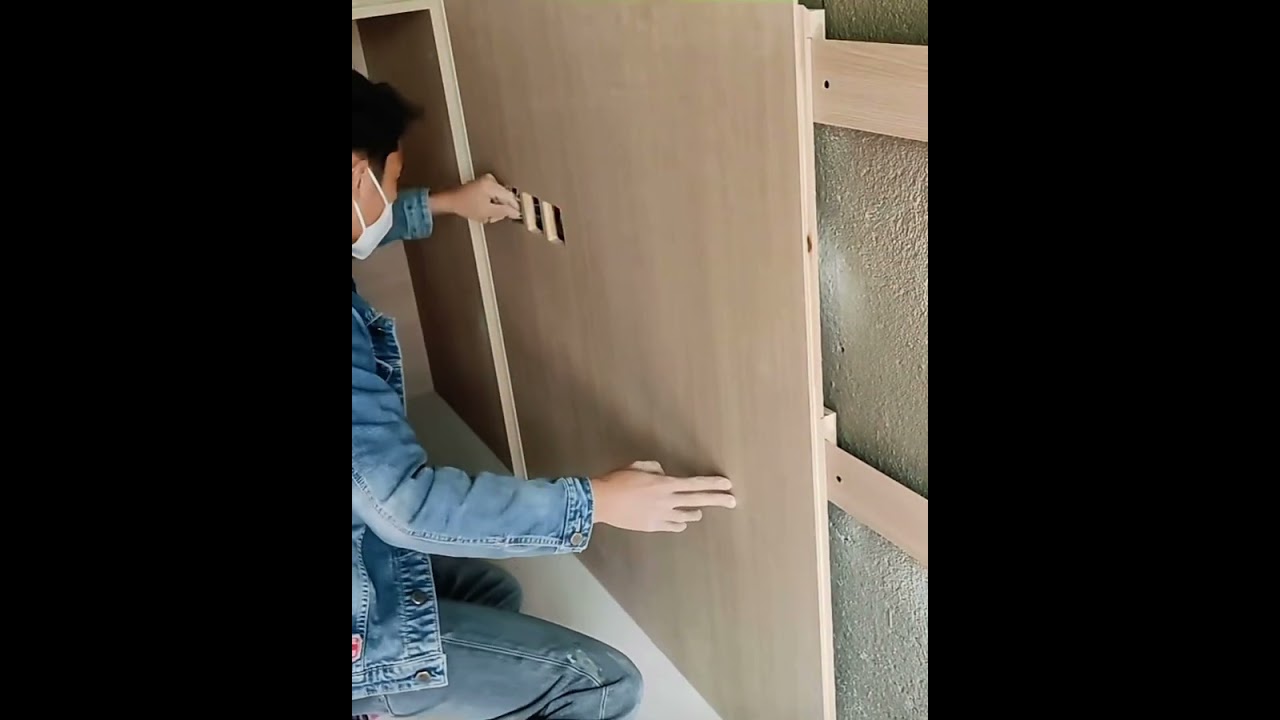 Wooden wall panel installation with french cleat by newspacehospitality