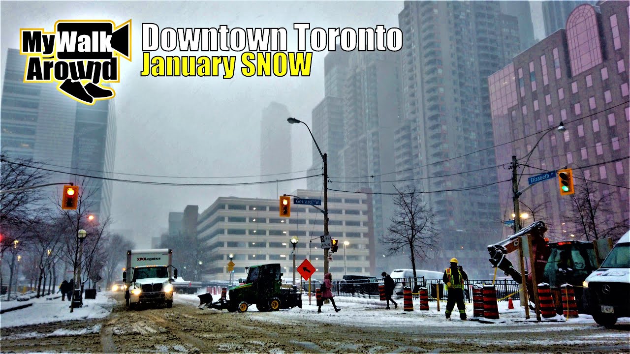 Taking a walk during a beautiful snowfall in Downtown Toronto - walking tour 4k video