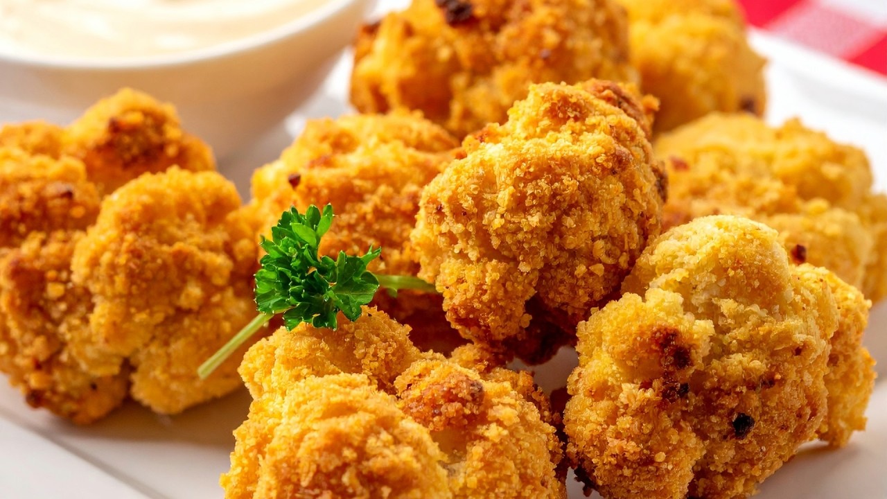 Käseüberbackene Blumenkohlbällchen – vegetarischer Genuss aus dem Ofen